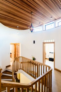 High-level windows upstairs flood the spacious landing with light