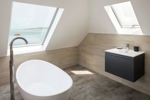 modern bathroom with sea views