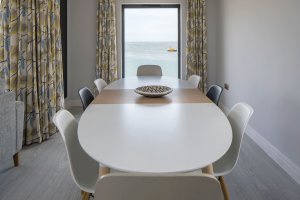 modern dining area with sea views