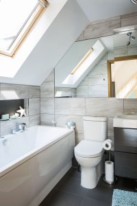 Modern bathroom with grey tiles