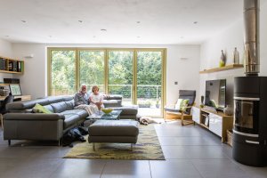 Living area with glazed doors and woodburner