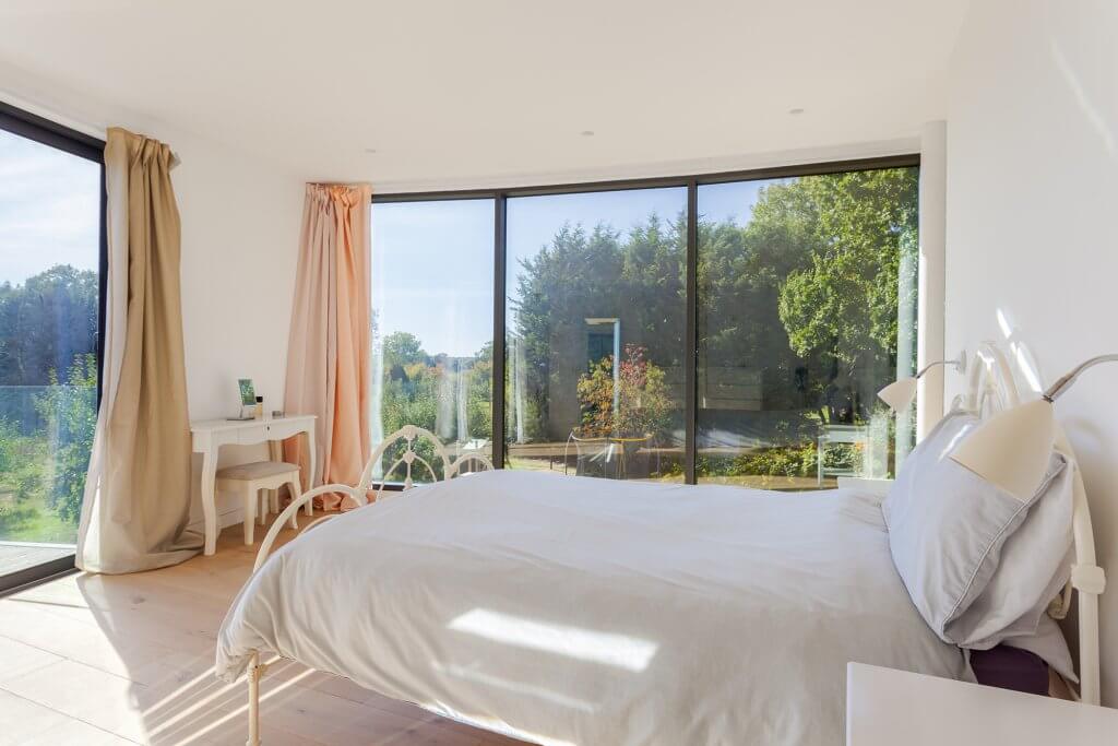 Bedroom with ample glazing