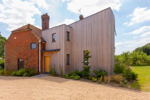 Modern curved extension to period home