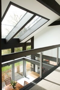 Overhead glazing makes for a light dining room
