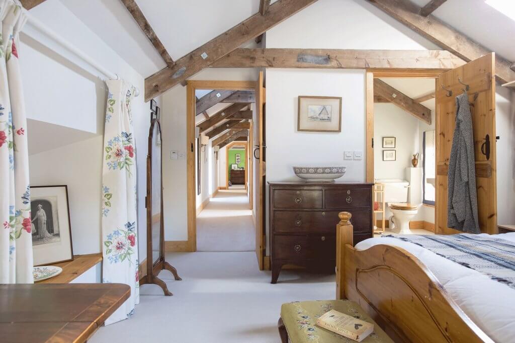 bedroom with a-frame beams