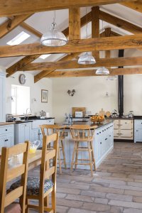 farmhouse kitchen with wooden beams