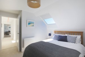 Modern bedroom with skylight