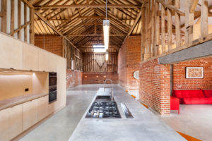 Cathedral ceiling barn conversion by David Nossiter Architects