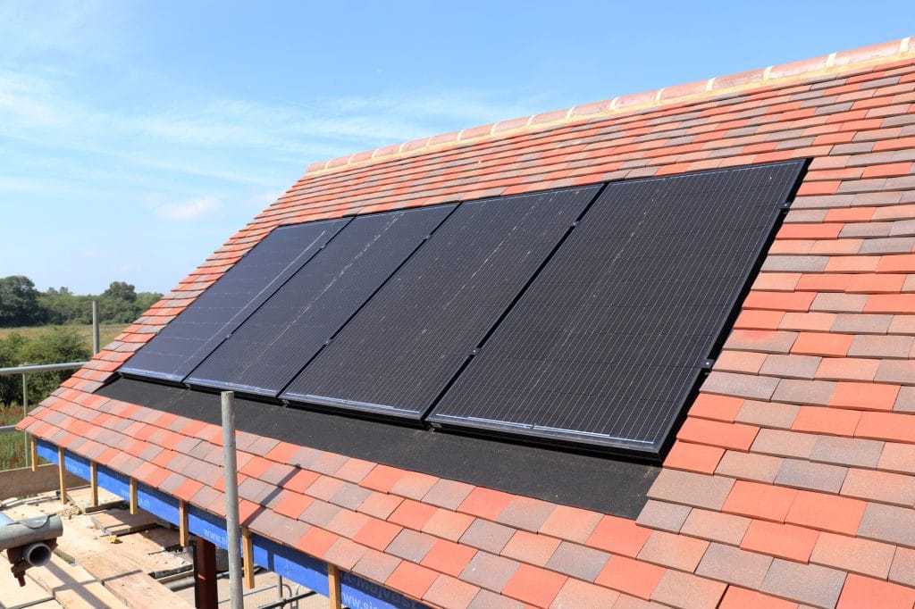 Solar electric PV panels in tiled roof