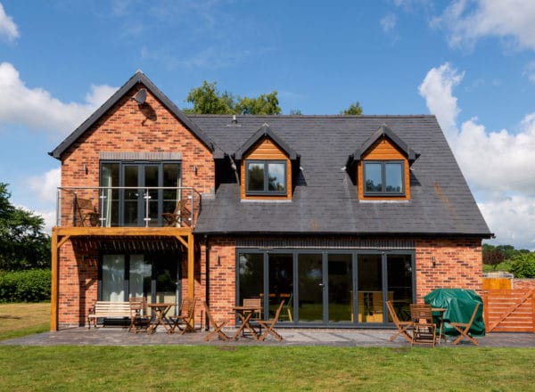 Glazed timber house