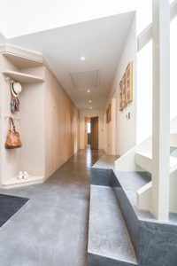 Cream hallway with stone flooring