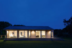 Lit up glazed house at nightime