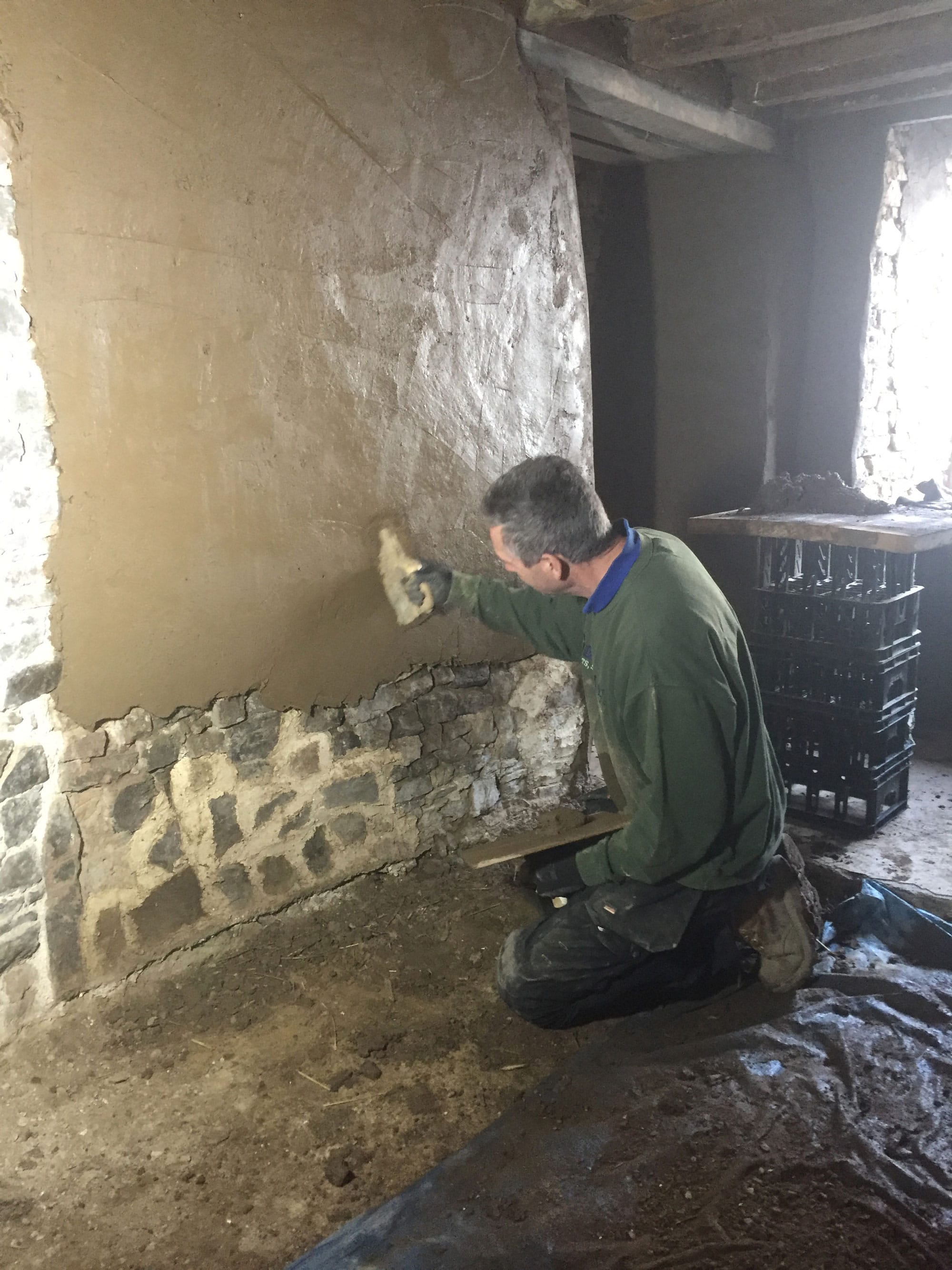 Man plastering a wall