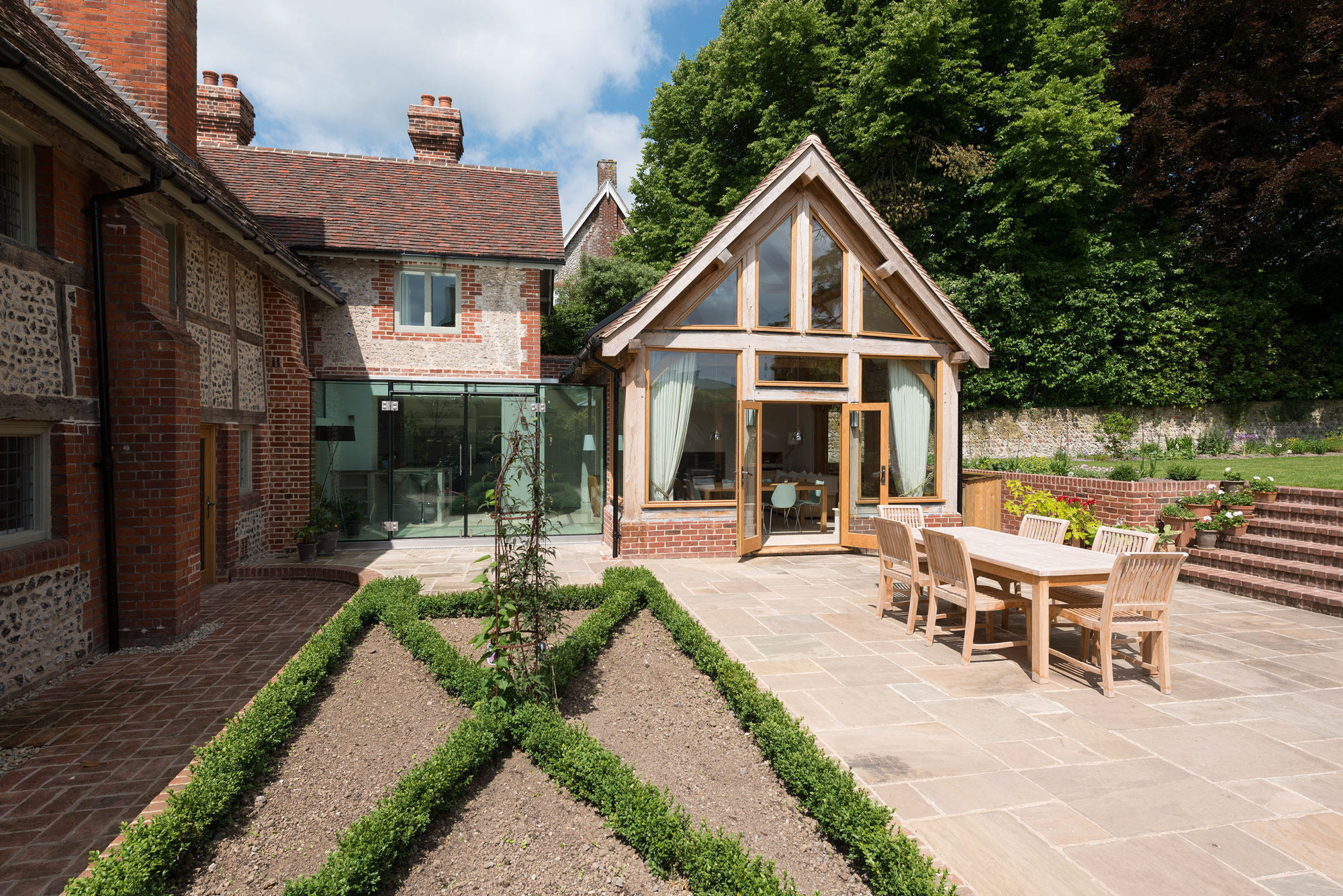 Traditional home with oak frame side extension
