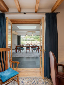 Dining room with exposed beams