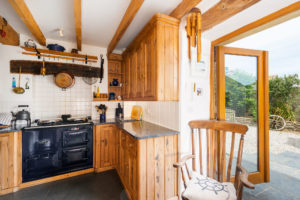 Kitchen with exposed beams