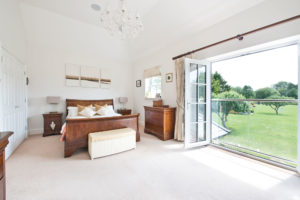 Bedroom with folding doors