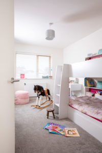 Children's pink and white bedroom