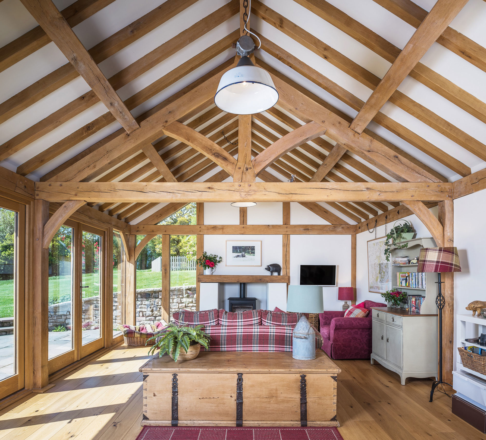 Large room with exposed oak beams