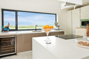Contemporary kitchen overlooking fields