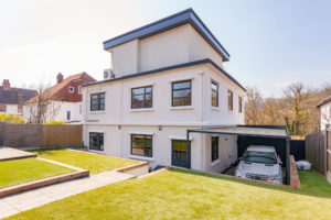 Large detached house with loft extension and adjoining garage