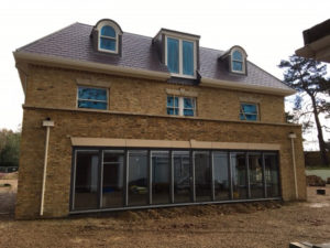 Large deatcehd house with glazing