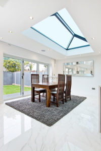 Open plan living area with rooflight