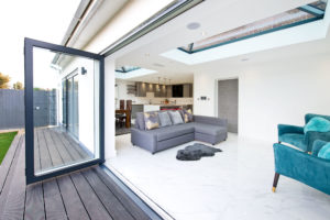 Large open plan living area with bifold doors