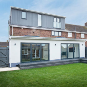 Home with rear and loft extension