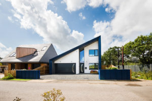 Contemporary home with blue solar panels