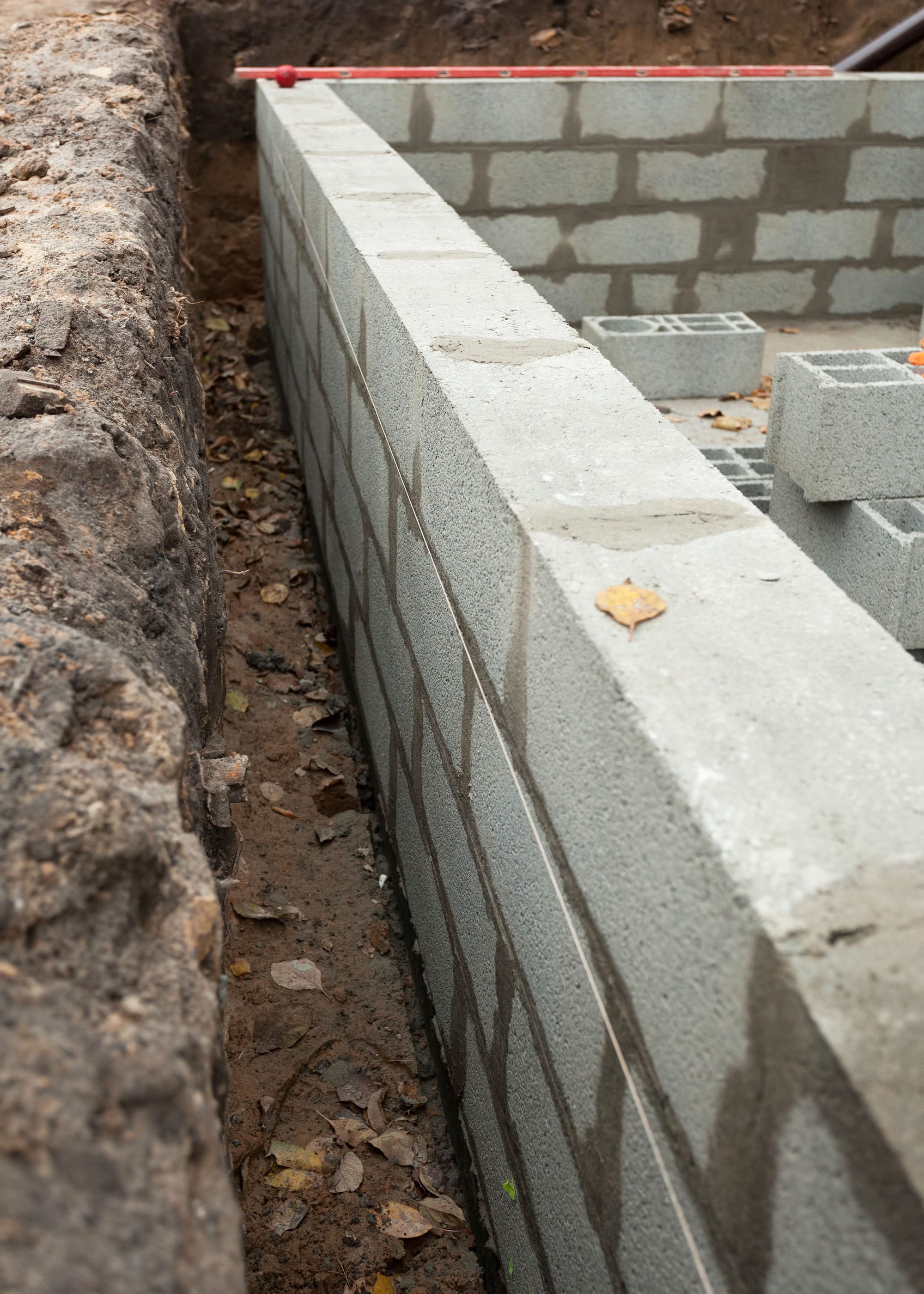 Blockwork wall with trench