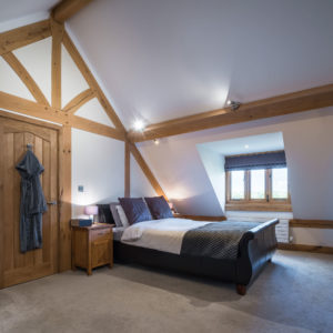 Master bedroom with exposed beams