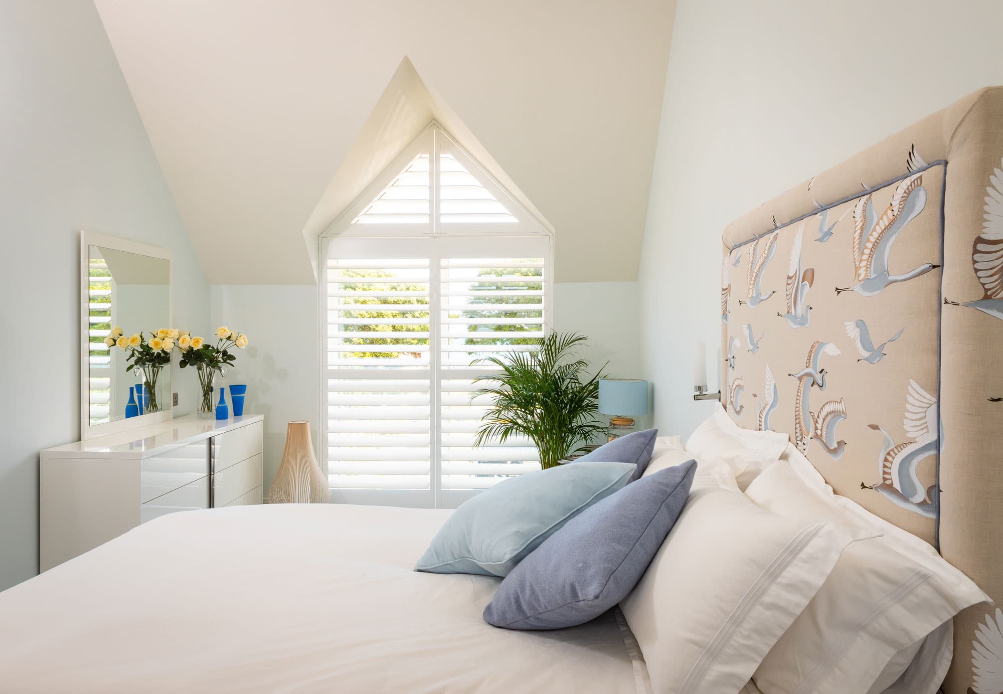 Bedroom with shutters
