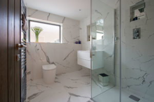Shower room with white marble