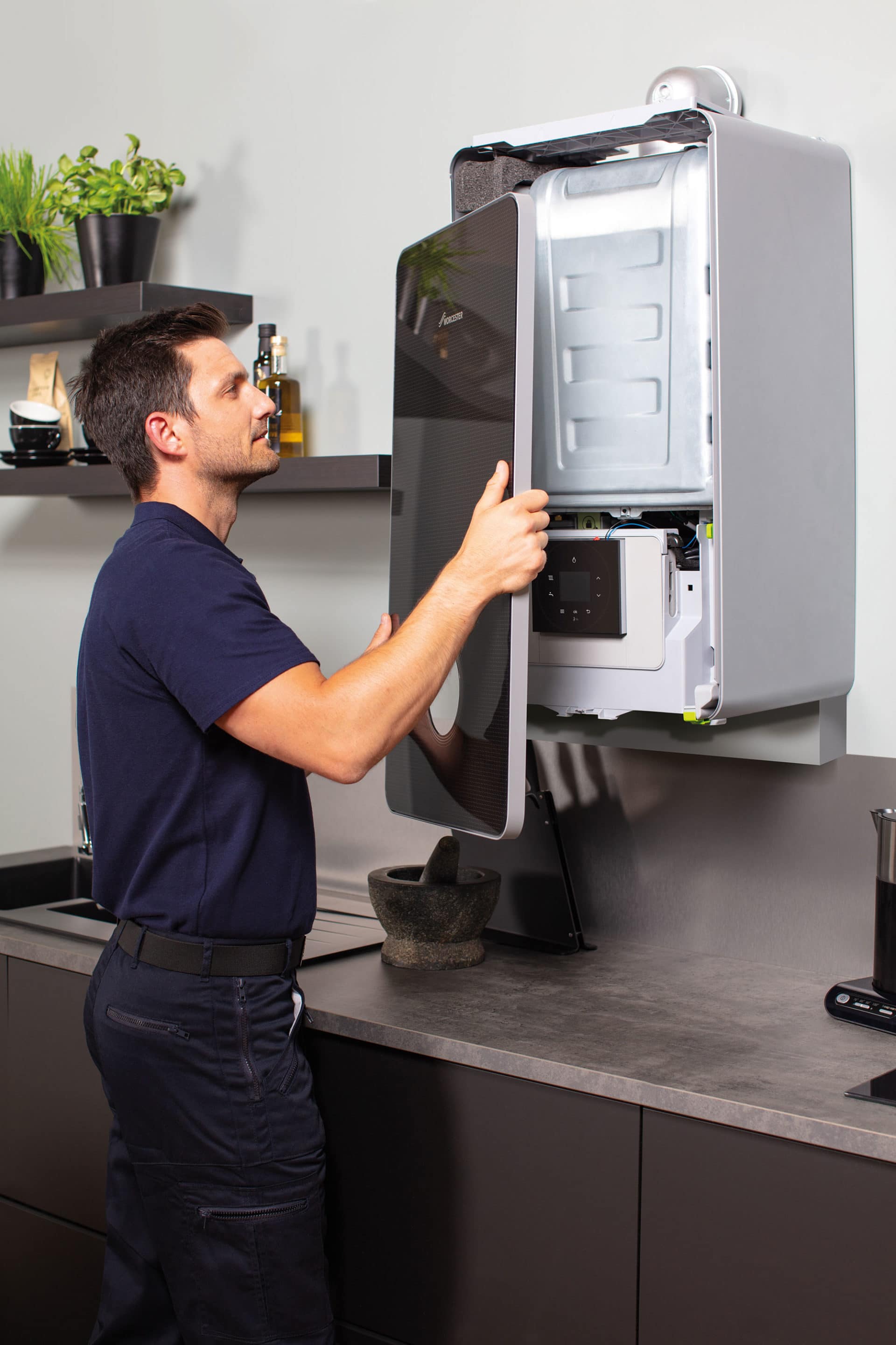 Man fits boiler