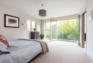 Bedroom with glazed door onto balcony