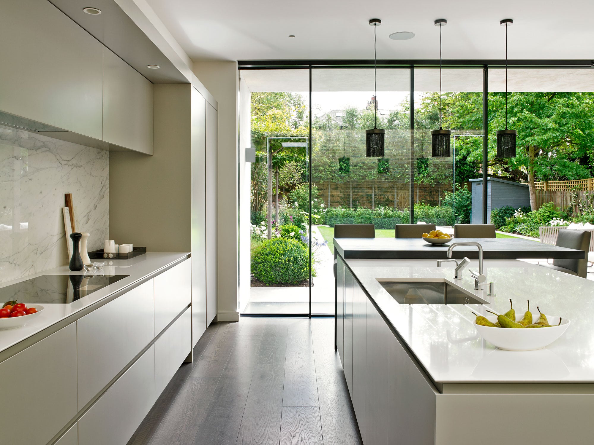 Modern kitchen with glass sliding doors
