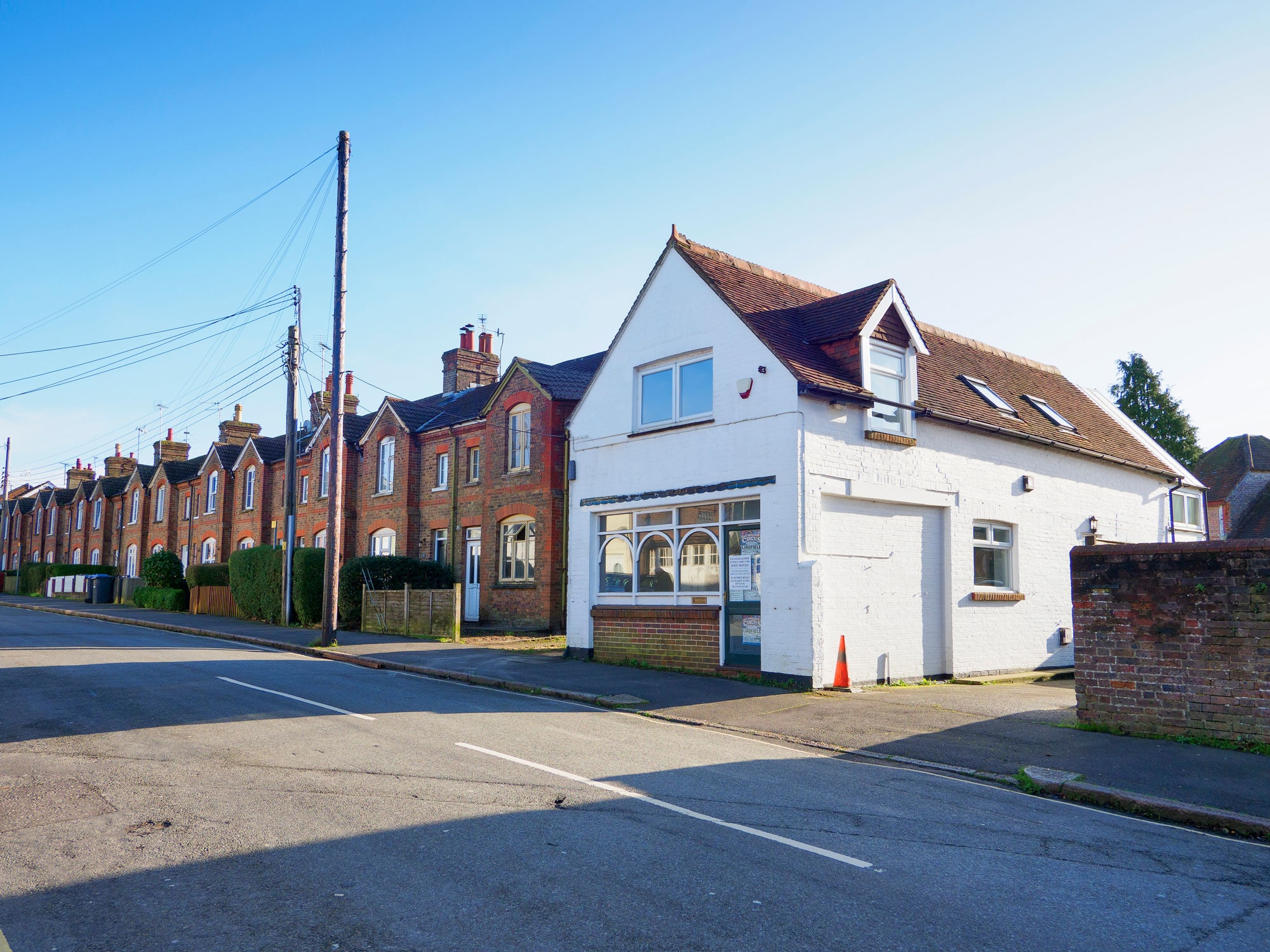 End of terrace house with white render