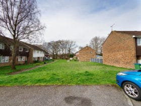 Grass plot on building estate