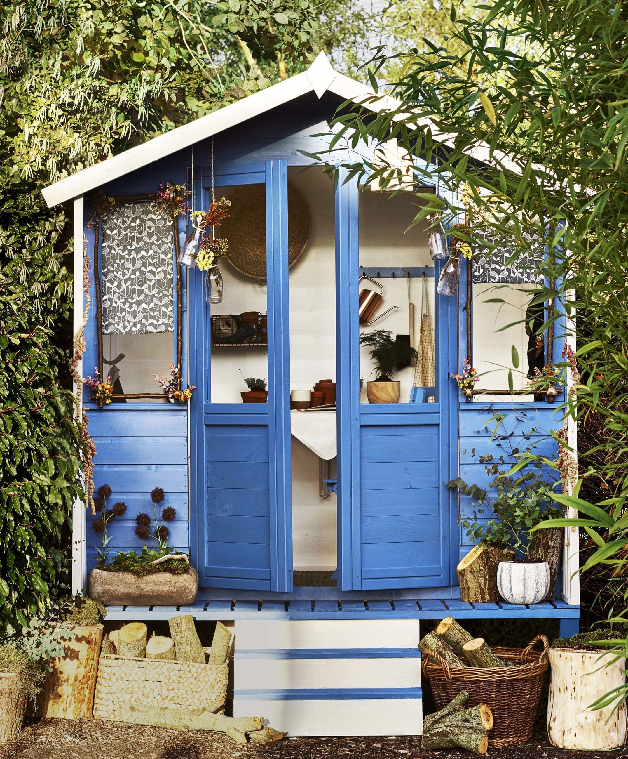 garden shed painted blue with Cuprinol Garden Shades range 