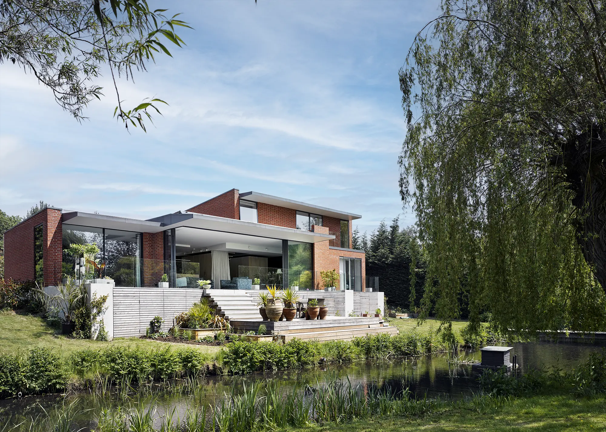 Waterfront Mid-Century Style Self Build with Unique Brick Details