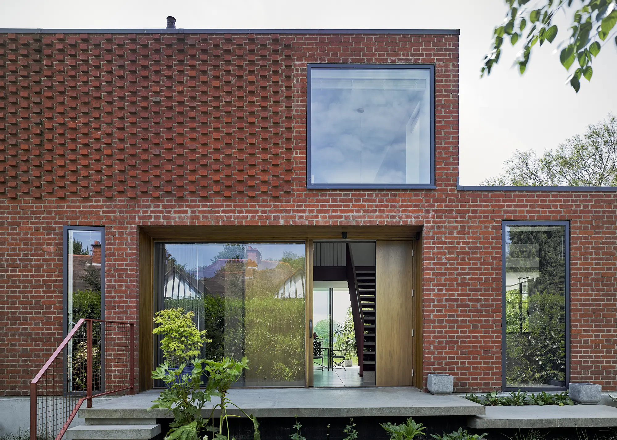 Waterfront Mid-Century Style Self Build with Unique Brick Details