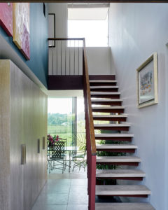 Entrance with mid century modern stairs