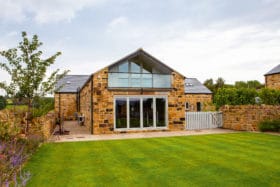 Brick house with glazed wall