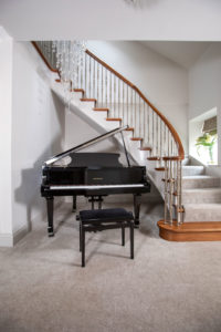 Hallway with curved stairs