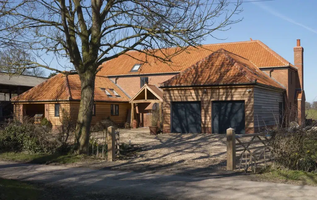 Red brick house with tiled roof
