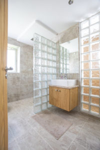 bathroom with glass wall