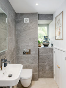 En suite with grey tiles
