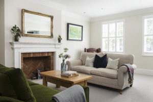 Living room with white carpet