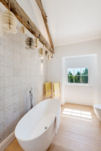 Bathroom with exposed beam
